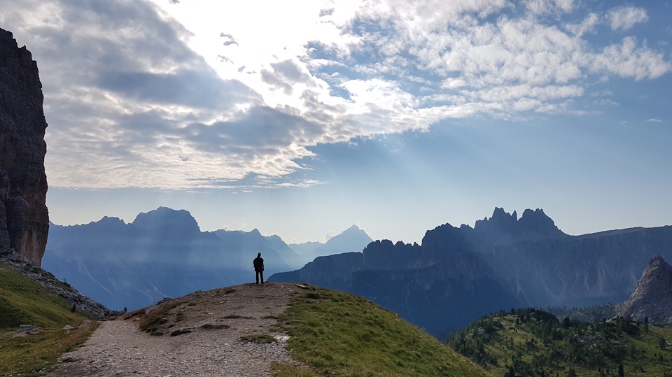 Hiking around the Cinque Torri in the early morning, on stage 5 of our Dolomites Highlights Tour