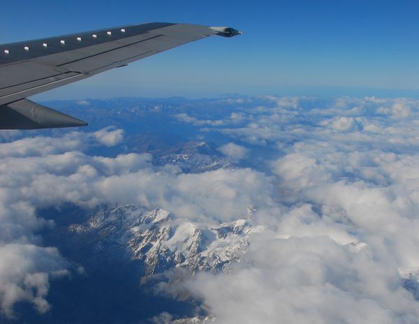 Aeroplane wing over the Alps on route to Venice