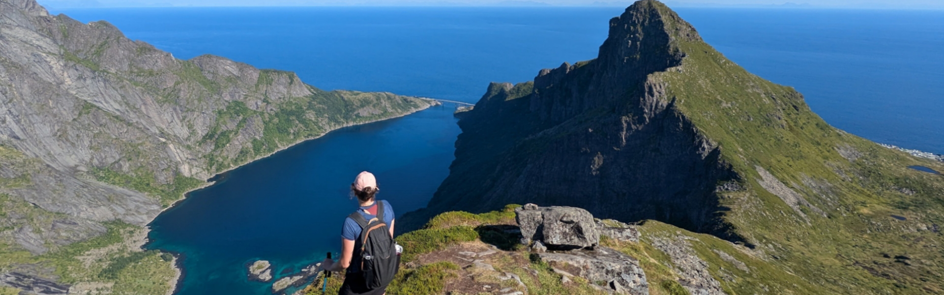 Hiker in the Lofoten islands, the sea ahead