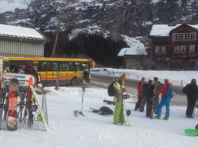 Skiiers waiting for a bus at the First area, Grindelwald