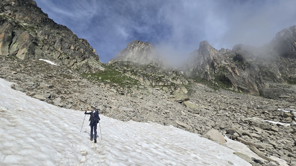 Crossing a snowpatch on the Tour du Mont Blanc